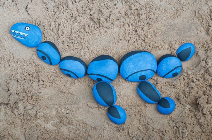 Plesiosaur Painted Rock Craft in the Sand